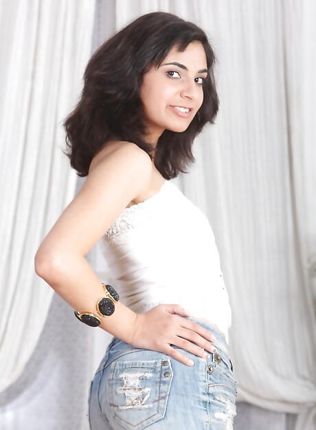 Gracile babe Anita Burma in fancy shorts unveiling tiny tits and ass 