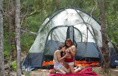 Curious women Monica Sexxxton and Renna Ryann enjoy some playful lesbian action outdoor